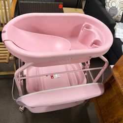 Baby bathtub with changing table,