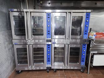 2 double stacked commercial ovens