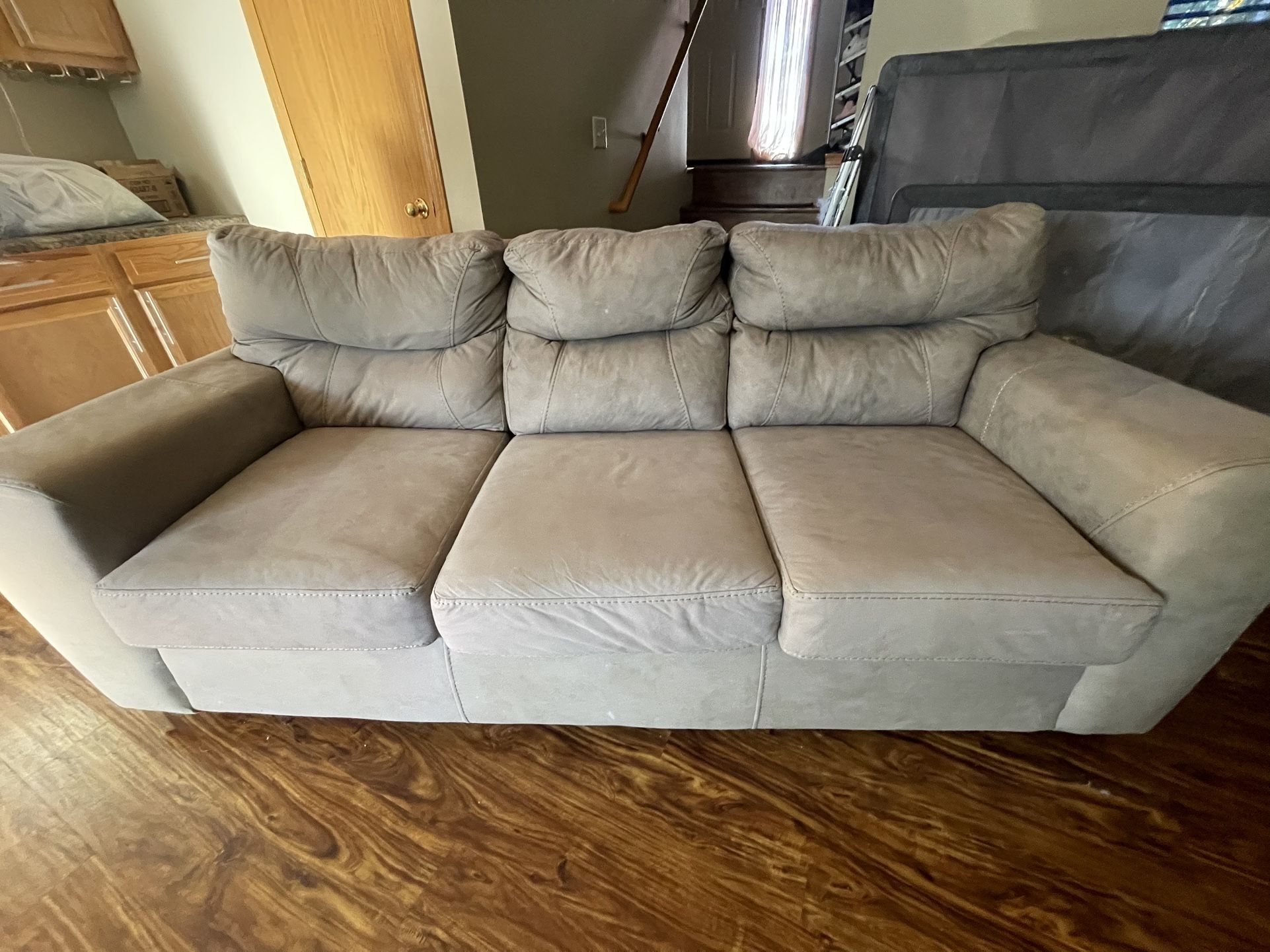 Three Seated Light Brown Couch