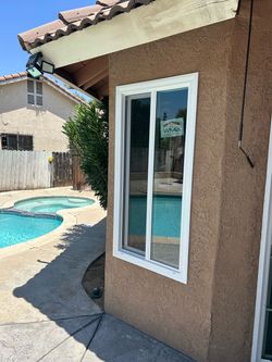 White Vinyl Sliding Window