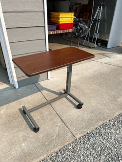 Over the bed table on wheels