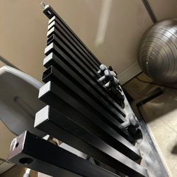 Weight Rack With Shown Dumbbells 