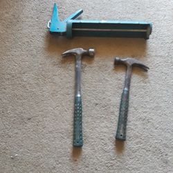 Two Easteing Hammers and large caulking gun 