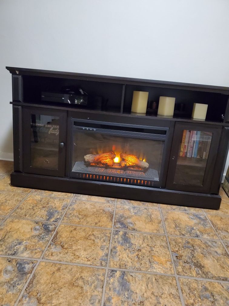 TV Stand with Fireplace & added picture frames