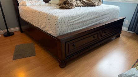 King size bed frame (only) with storage panels from Ashley furniture