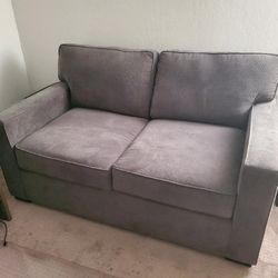 Macy's Modern Loveseat in excellent condition - $250 (Chino)

