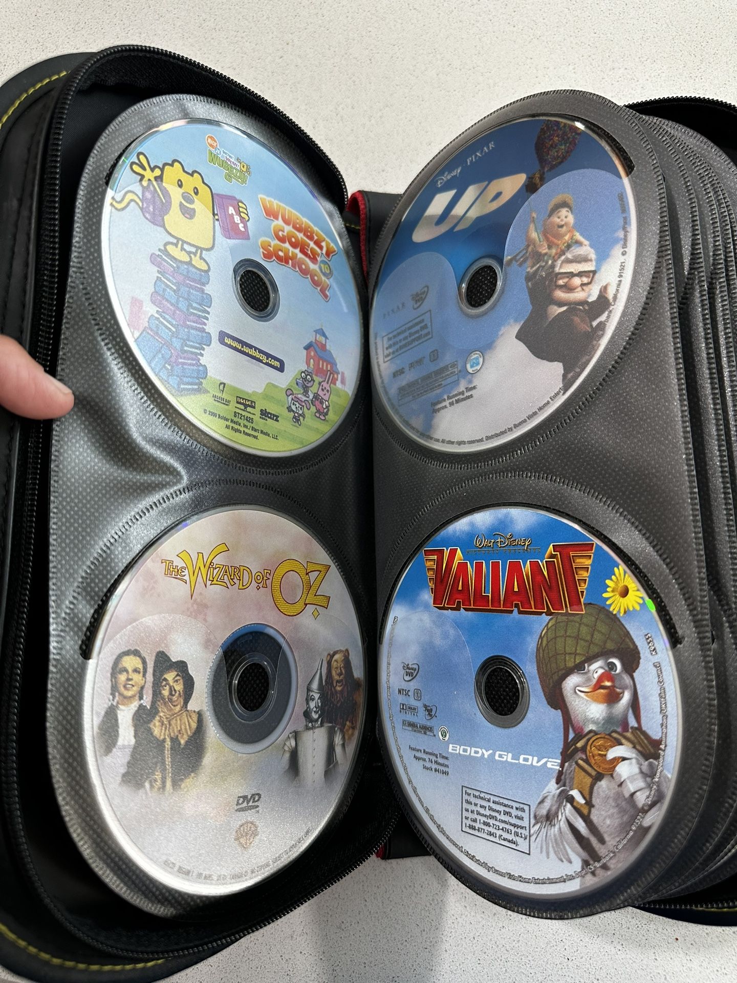 57 DVD Children’s Movies - Some of the titles can be seen in pics.