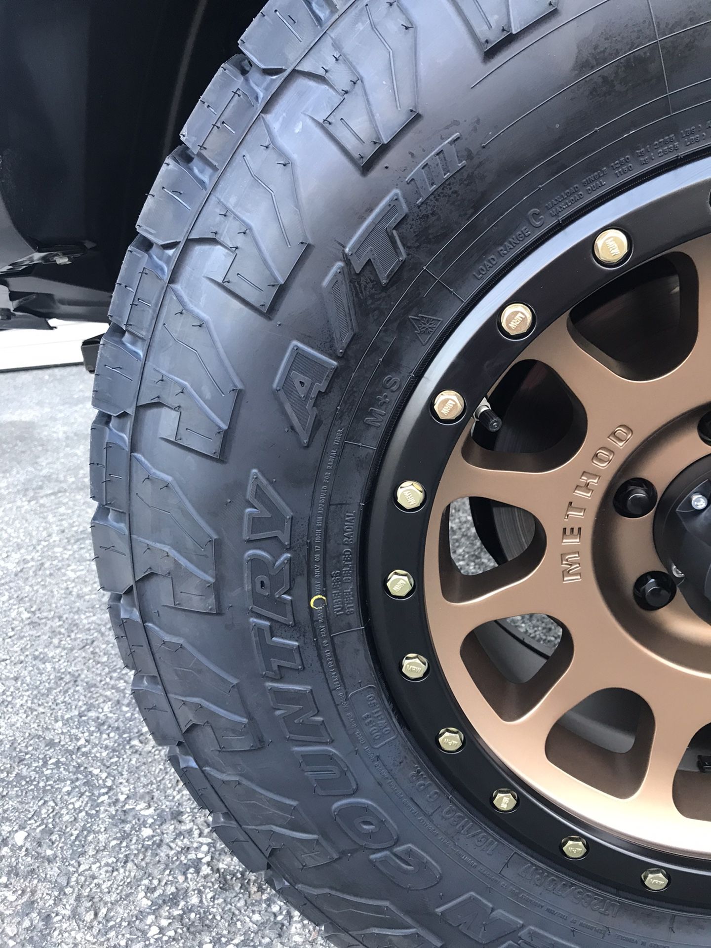 Method mr305 bronze nv wheels with TOYO open country at3 LT285/70/17 4runner Silverado