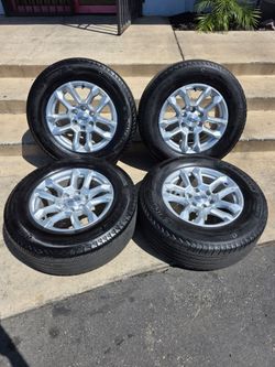 18" Chevy Silverado OEM rims Michelin tires