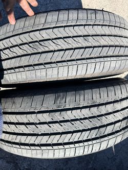 (2) 235/65R18 PAIR OF USED TIRES BRIDGETONE 65% LIFE !!