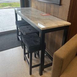 Table and three stools $450 brand new