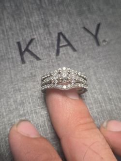 Engagment and wedding band set with his rings also