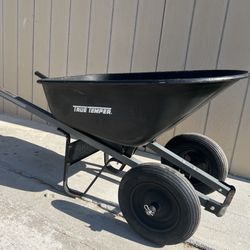 True temper  Metal handles  6 cubic feet  2 wheels 🛞  Wheelbarrow  Very good condition  Asking $90 