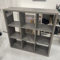 9 cube gray bookshelf/ organizer.