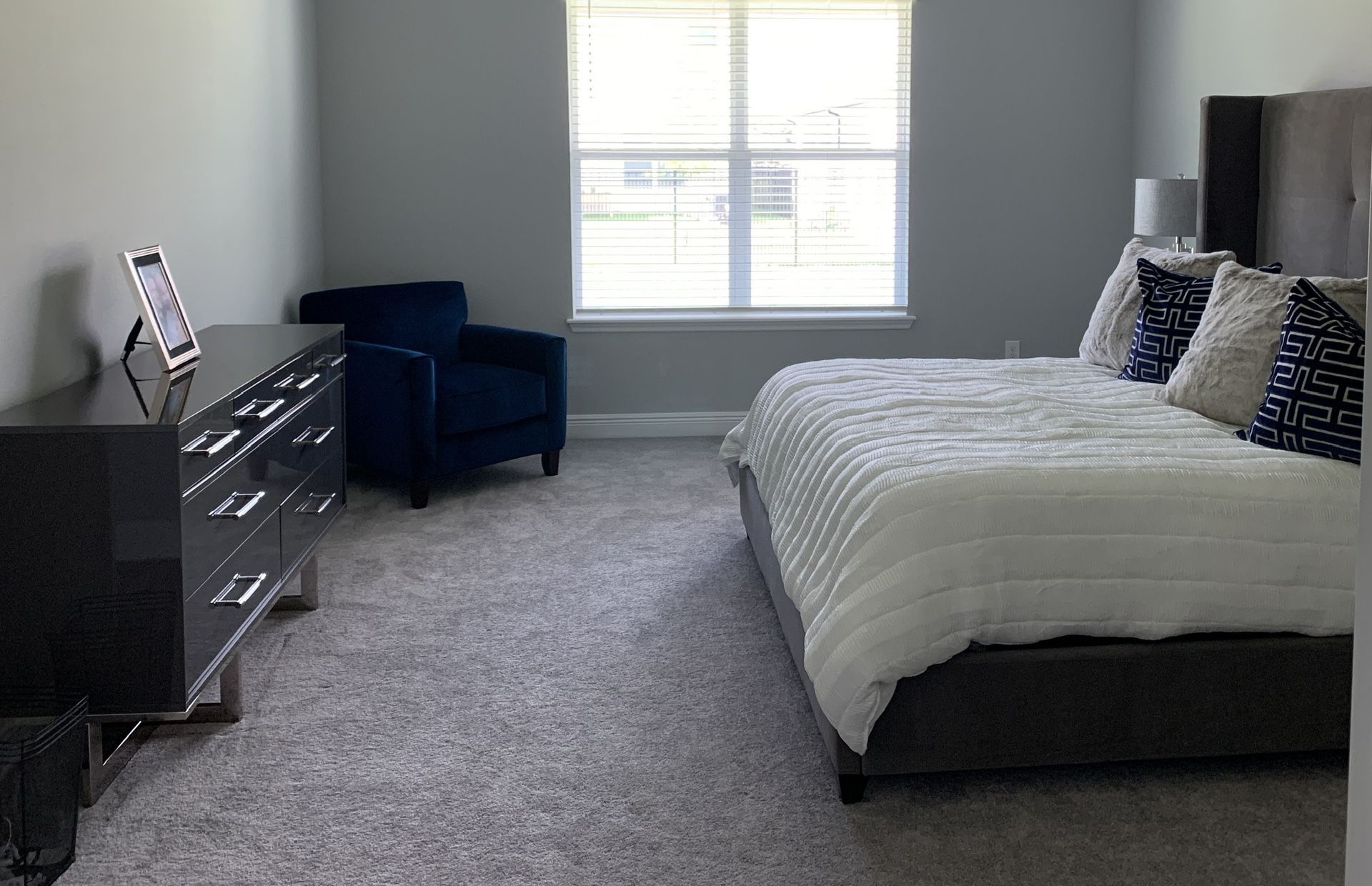 Contemporary Dresser and Blue Velvet Club Chair