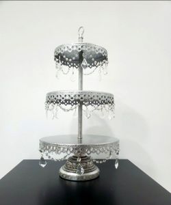 Opulent Treasure: an elegant 3-tier dessert and cake stand with a chandelier-inspired style. Features a beautiful design in silver and crystal, adorne