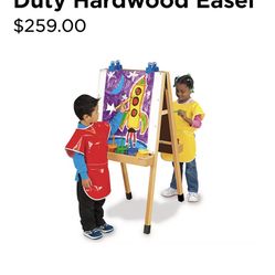 Lakeshore Heavy Duty Hardwood Easel, Vinyl Paint Aprons, No Spill Paint Cups, and Paint Brushes. 