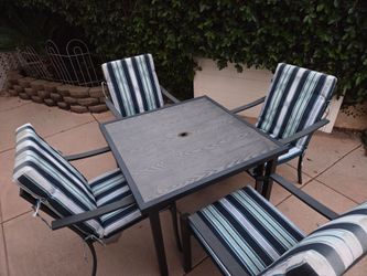 OUTDOOR TABLE & 4 CHAIRS