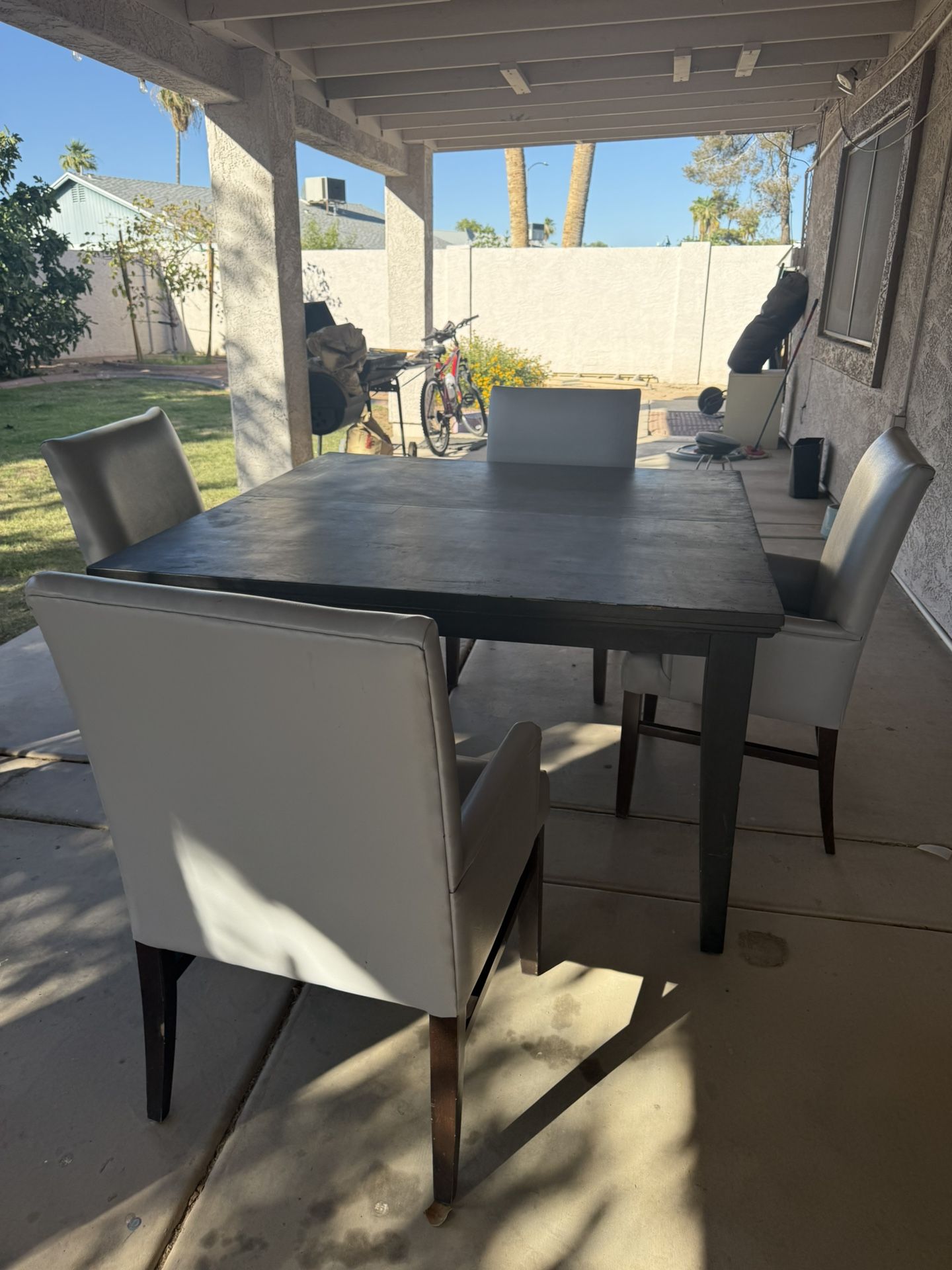 Table And Gray chairs