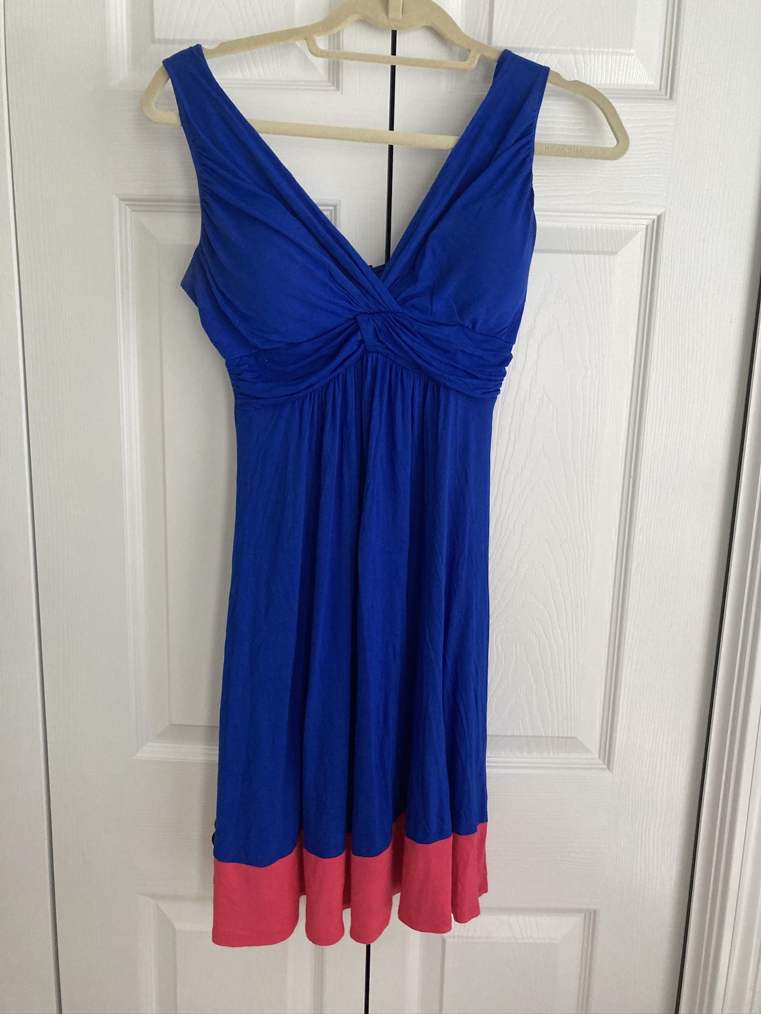 Summer dress purchased at a boutique. Like new! Flowy bodice/ tight & flattering around chest.