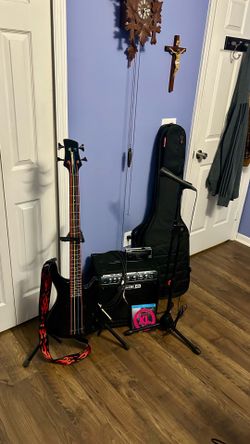 Bass guitar with everything as pitched guitar stand not included …. Selling as is. non-negotiable….. 250$ firm….