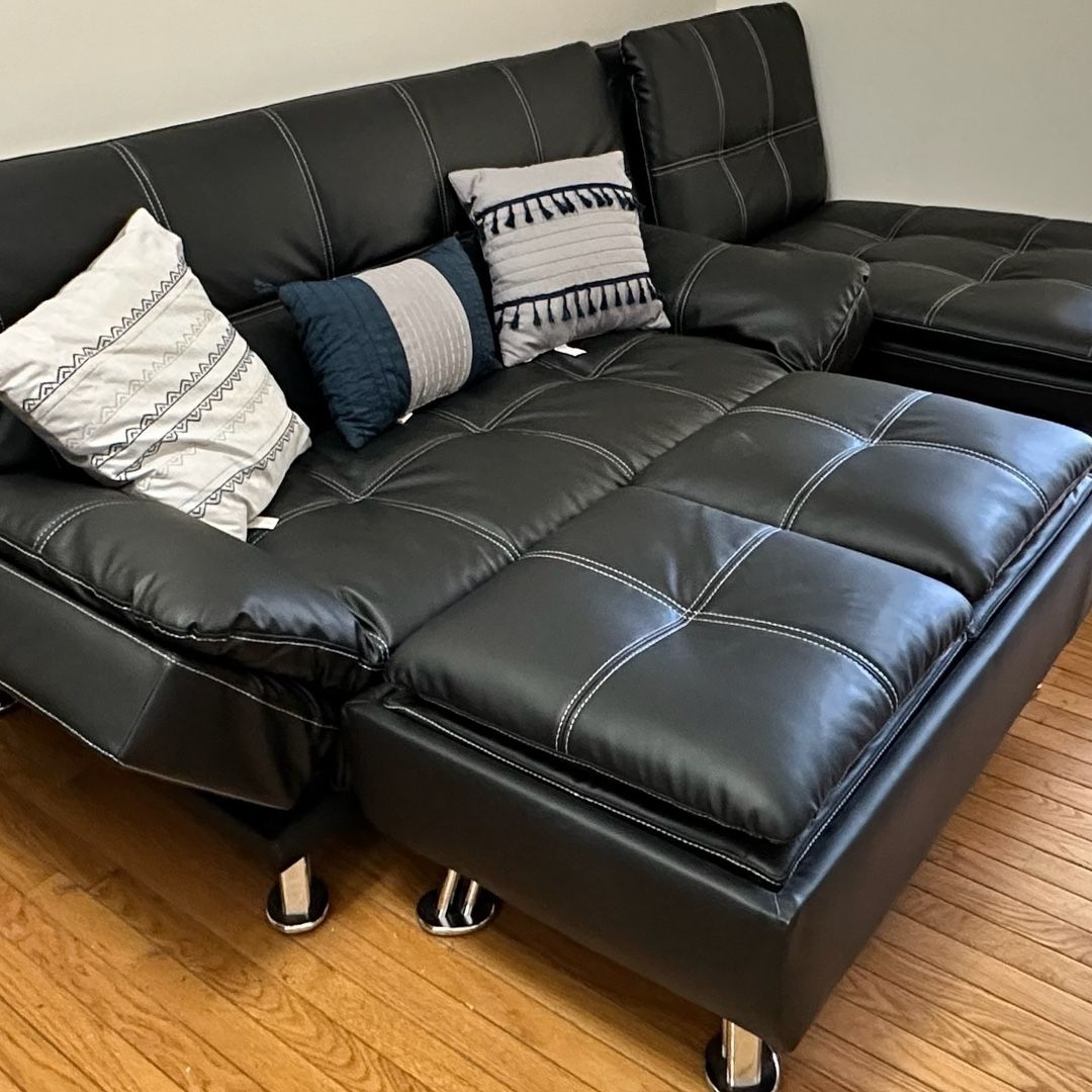 Black Faux Leather Sleeper Convertible Sectional & Ottoman