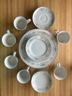 White Porcelain Dinnerware Set with Floral Pattern