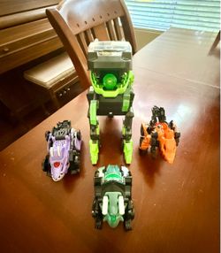 4 V-Tech Transforming Car/Dinosaurs