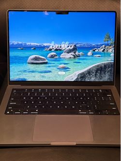 2021 14” MacBook Pro M1 Max 10 core CPU/24 core GPU, 32 GB RAM, 1TB SSD. Comes with power adapter. Small scratch on top case but everything works grea