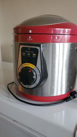 Wolfgang Puck pressure cooker.