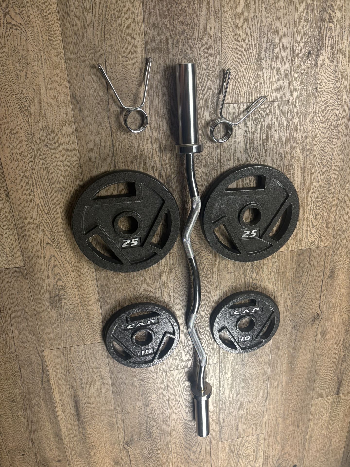 Beautiful BRAND NEW Curl Bar With Pair Of 25s And 10s 