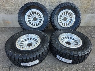 17" KMC beadlocks w/ 33" Toyo RT Pro