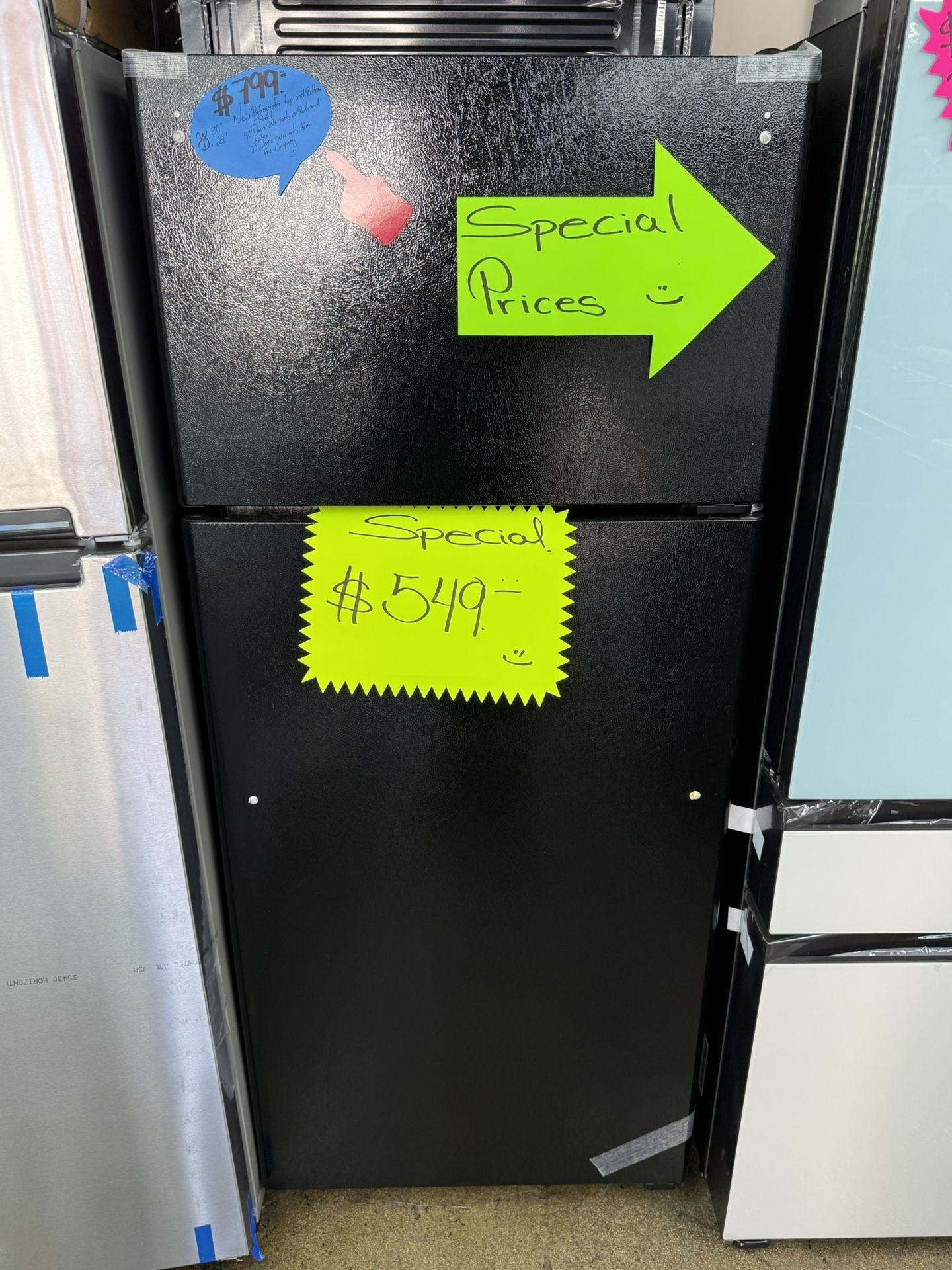 Brand new GE black top and bottom refrigerator