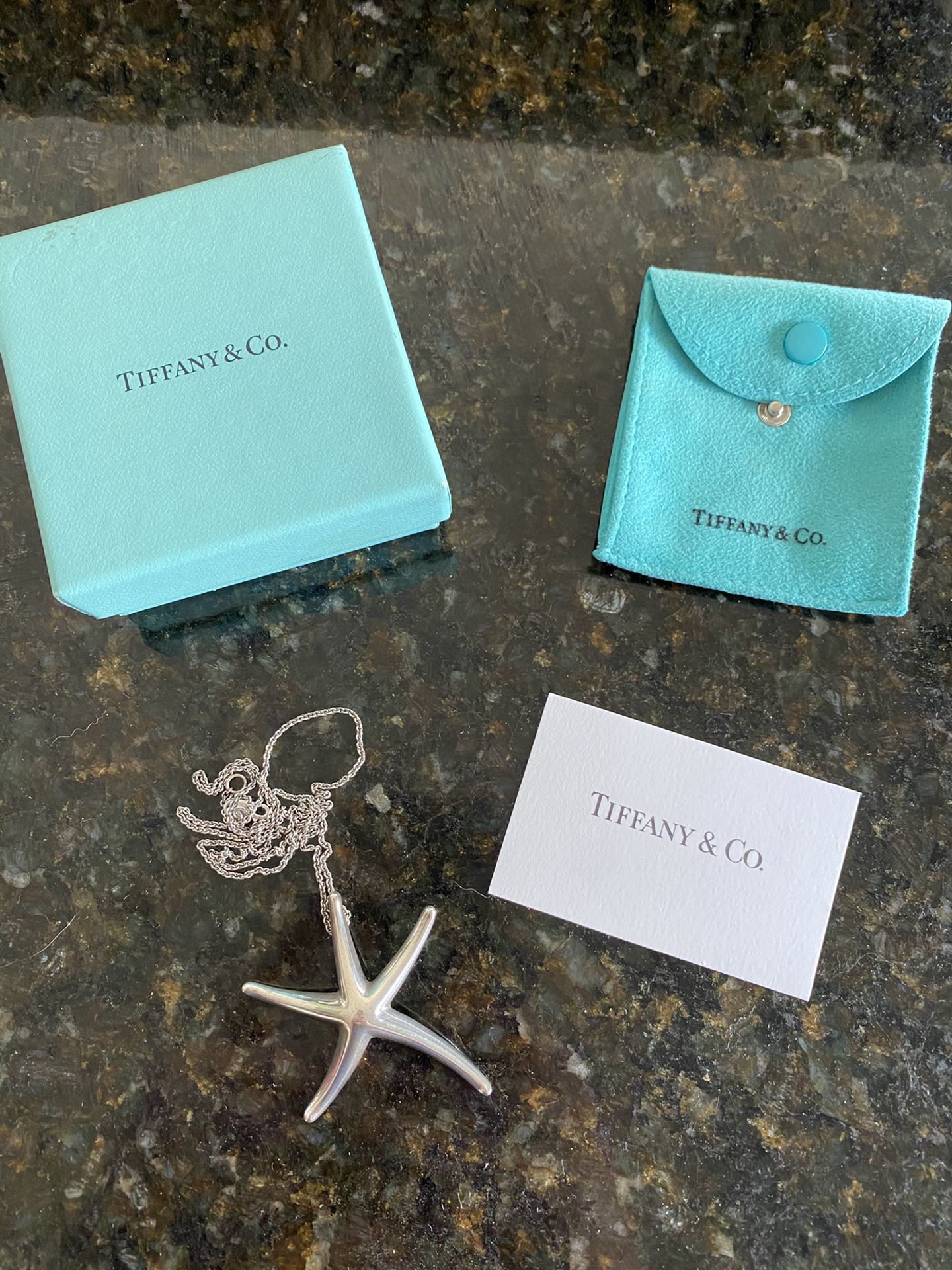 Retired Tiffany sterling silver starfish pendant necklace