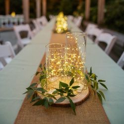 Wedding centerpieces - Fairy Lights, Glass, And Wood