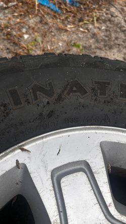 Set of 4 OEM Chevy 17-inch rims with Firestone Destination P265/70R17 tires, 6-lug pattern.