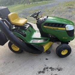 JOHN DEERE D100 RIDING MOWER 42" WITH BAGGER SYSTEM 216 HOURS ONLY $1200