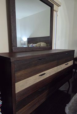 Dresser with a mirror