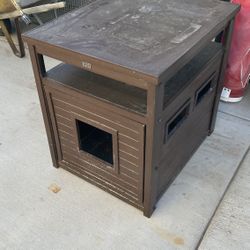 cat's litter box and function as an end table or bench