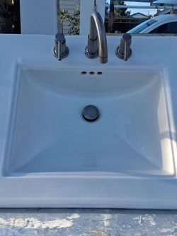 Toilet sink medicine cabinet