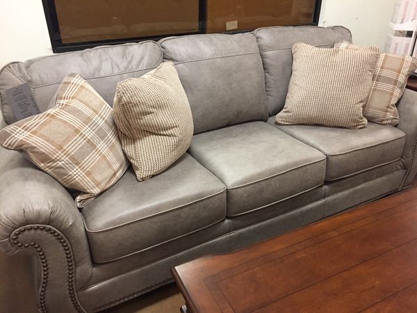 Brand New Ashley Olsberg Steel Sofa And Love Seat 519 And 489