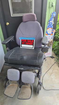 Motorized power wheelchair with charger