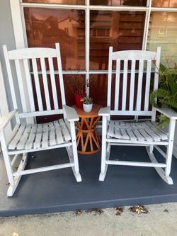 2 white Rocking Chairs