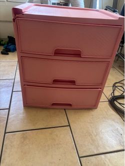 pink plastic dresser