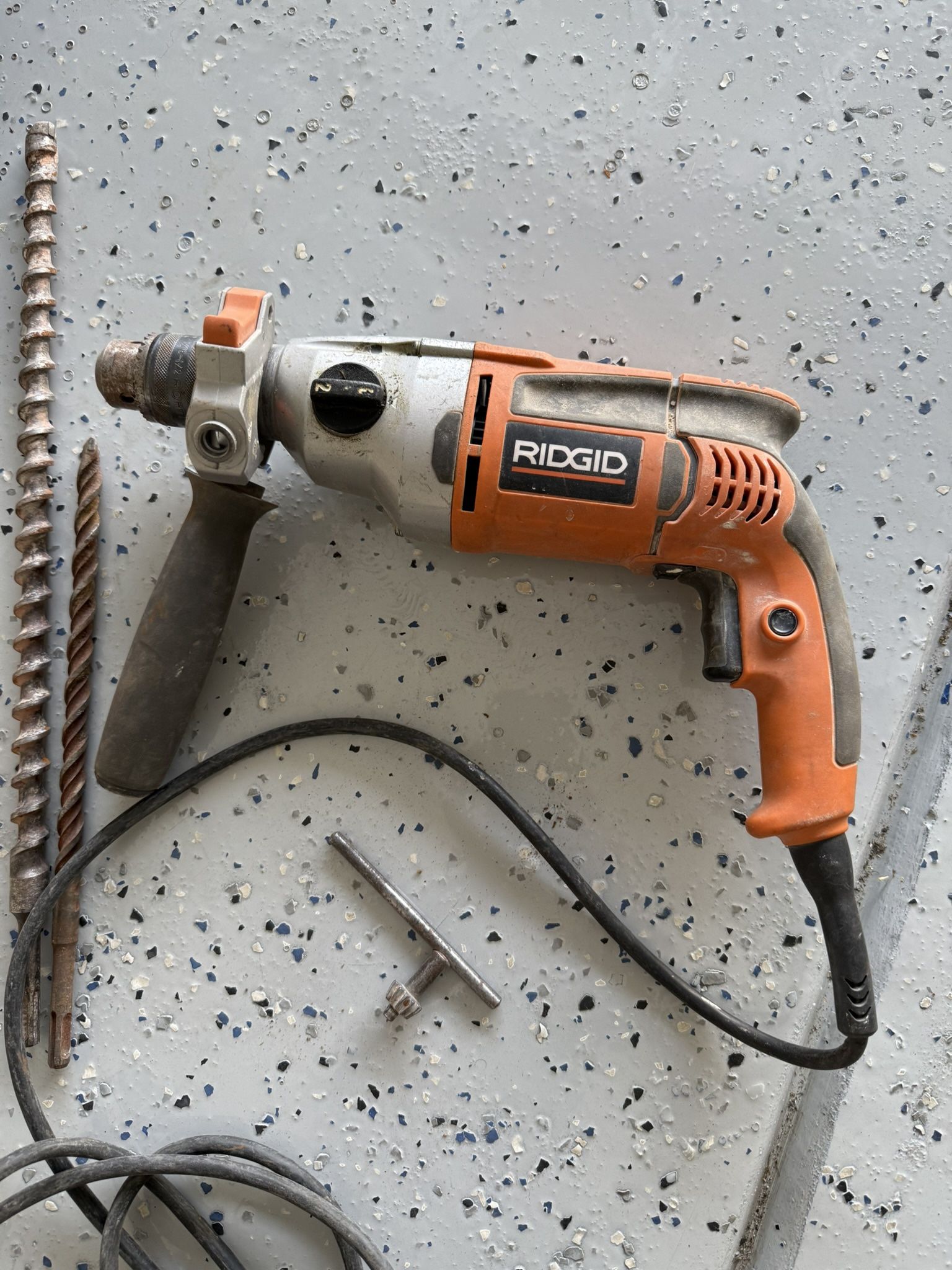 Ridgid Hammer Drill With Bag And Long Cement Bits And Several Other Wood Masonry And Steel Bits