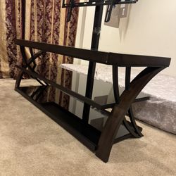 TV table and 2 living room chairs with 3 rugs, sizes, 6feet.10inches x 4.11. and10 feet x 6.5. And 12.5x 10.