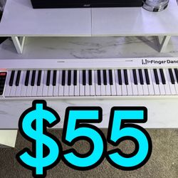 61 Key Wireless Foldable White Keyboard Piano $55