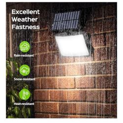 BRAND NEW IN BOX Solar Outdoor Lights, 202 LEDs Flood Lights with 16.4 ft Cable, Remote Control Solar Motion Sensor Outdoor Lights, 3 Modes Solar Powe