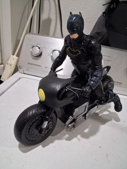 articulated batman 12 inches and batcycle. good condition.