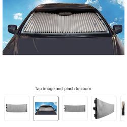 Grey Universal Retractable Windshield Sunshade with 6 suction cups to attach to the windshield
- Retails For $37!